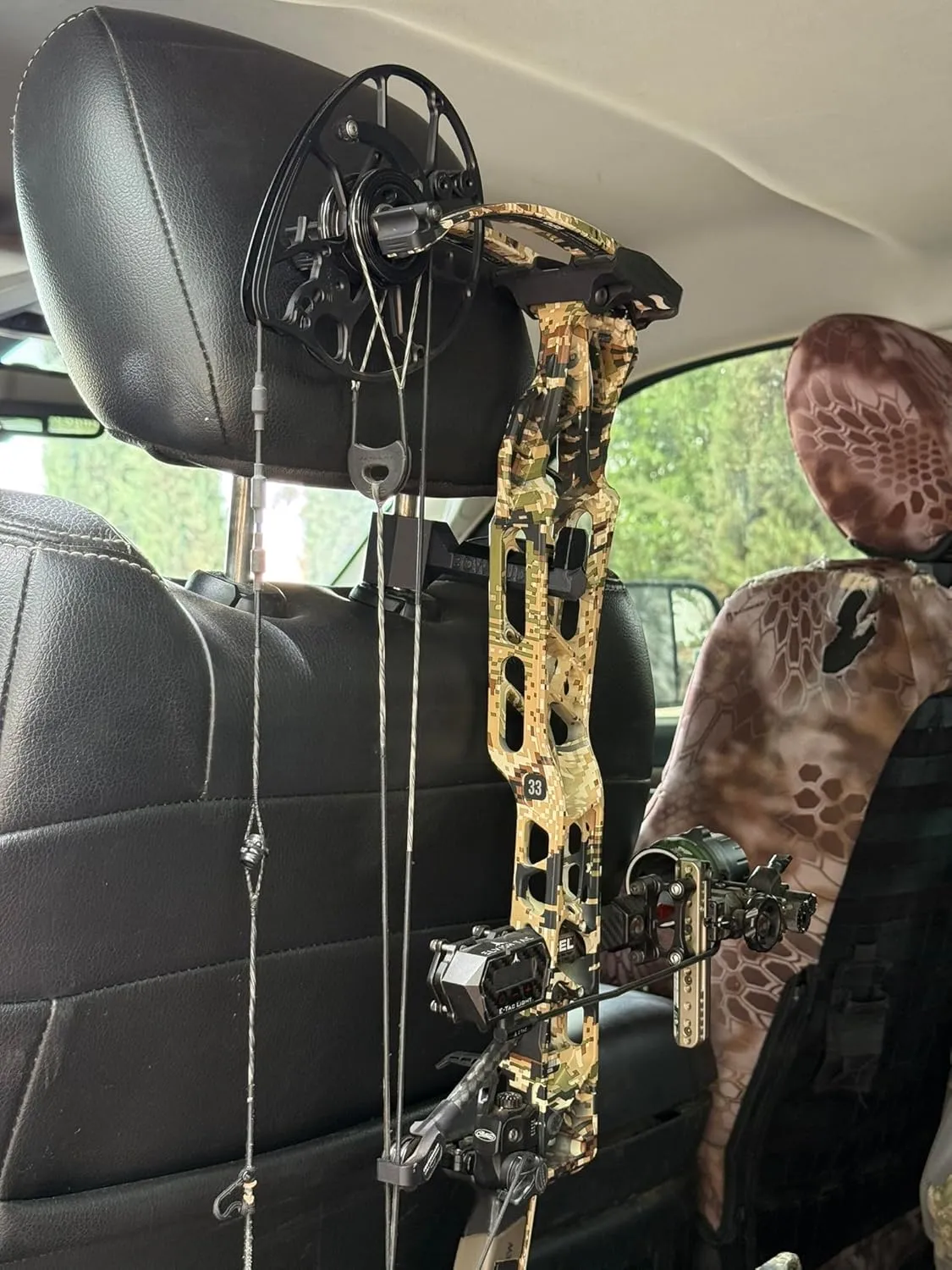 Original Bow Buddy  Headrest-Mounted Bow and Gear Hanger for Trucks & SUVs  Holds Bows, Backpacks, Hats, and More  Rubber Protector and Spacer Ring Included | Made in USA | No-Tool Install